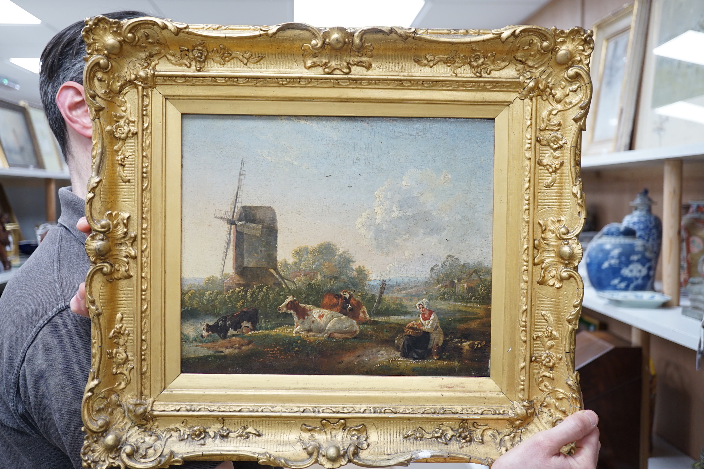 19th century English School, oil on wooden panel, Woman and cattle beside a windmill in a landscape, 27 x 31cm